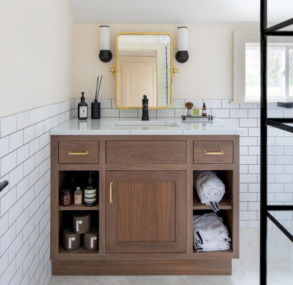 Wooden bathroom cabinet with white tiles