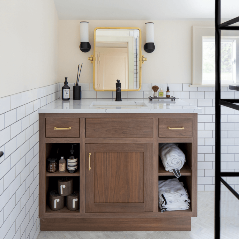 Wooden bathroom cabinet with white tiles