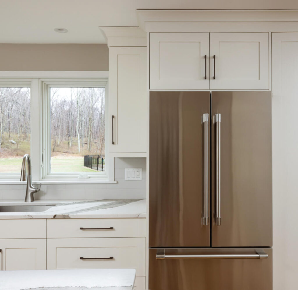 white and brown kitchen cabinet