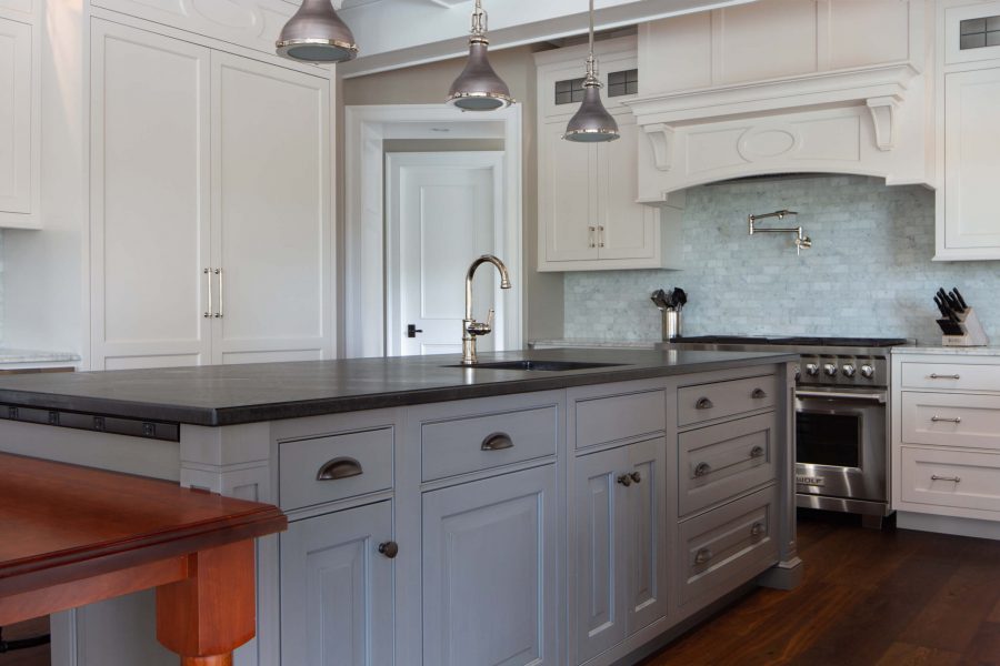 white kitchen cabinet and countertop