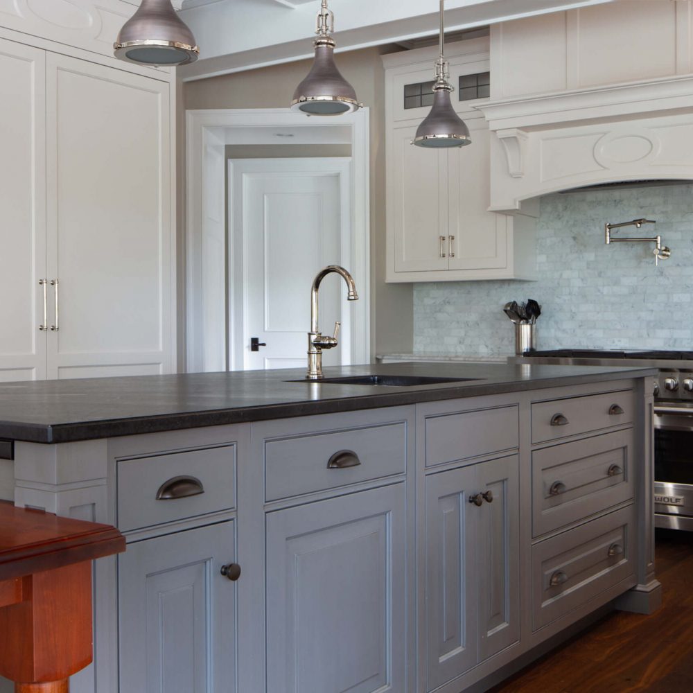 white kitchen cabinet and countertop