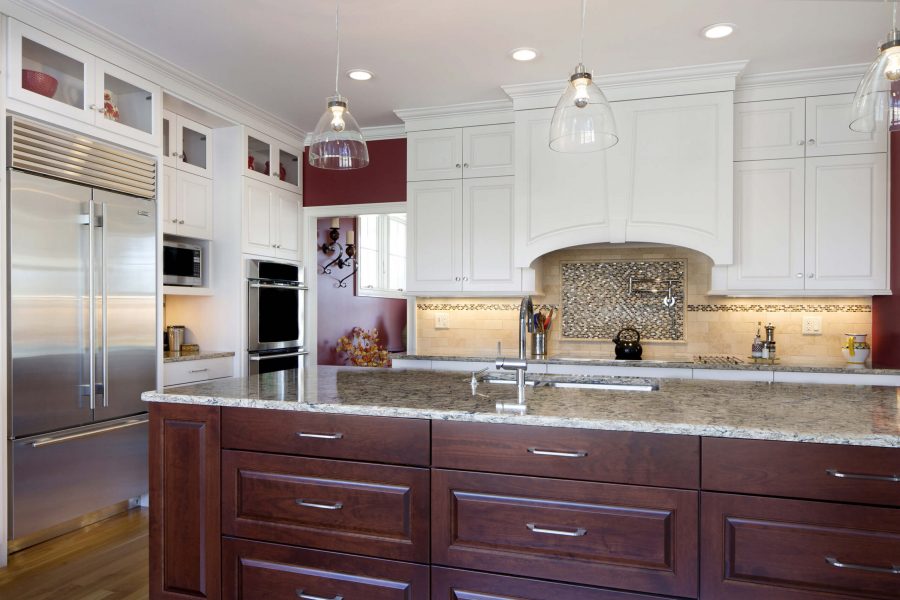 dark mahogany cabinet with light brown stone countertop